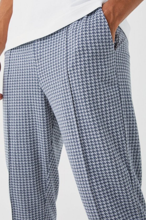 Schmale elastische Hose mit Hahnentritt-Print