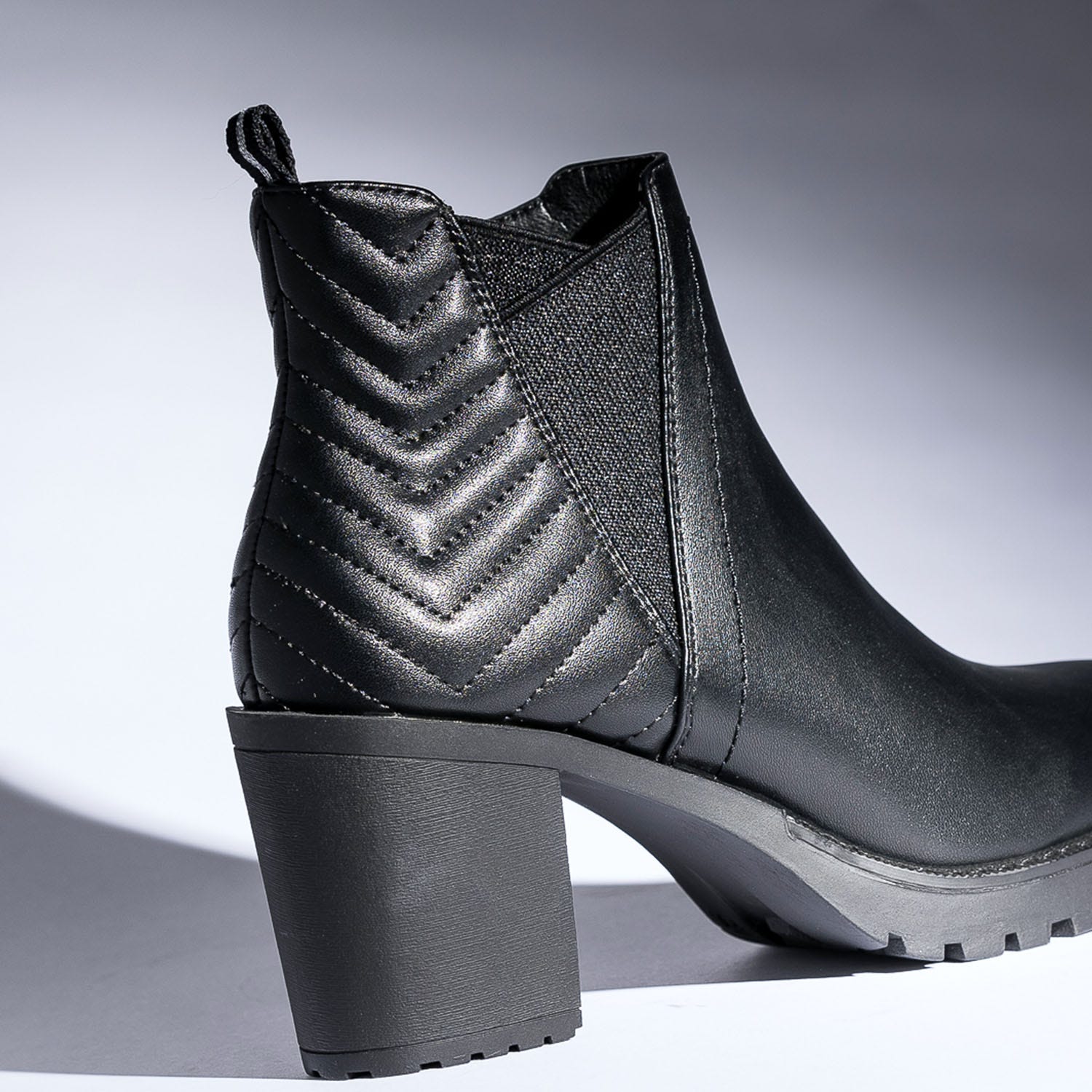 Boots TEXTO noir cranté avec contrefort matelassé
