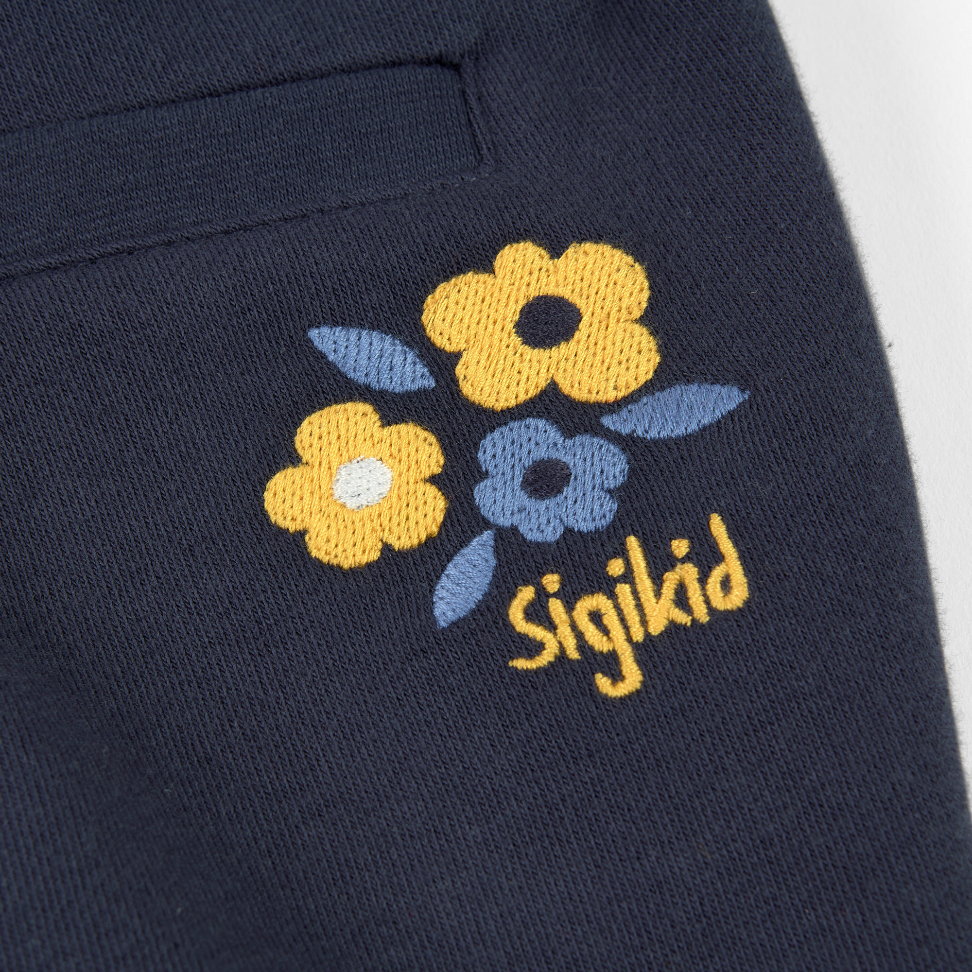Dunkelblaue Kinder Sweathose Blümchen
