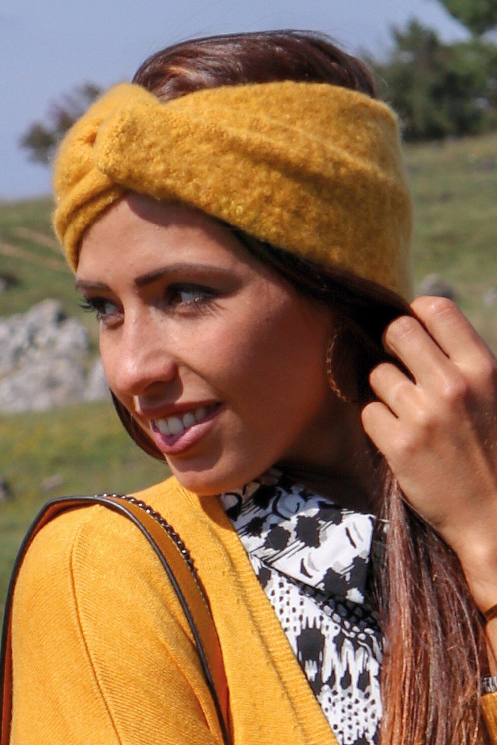 styleBREAKER Stirnband (1-St) Weiches Feinstrick Stirnband mit Twist Knoten
