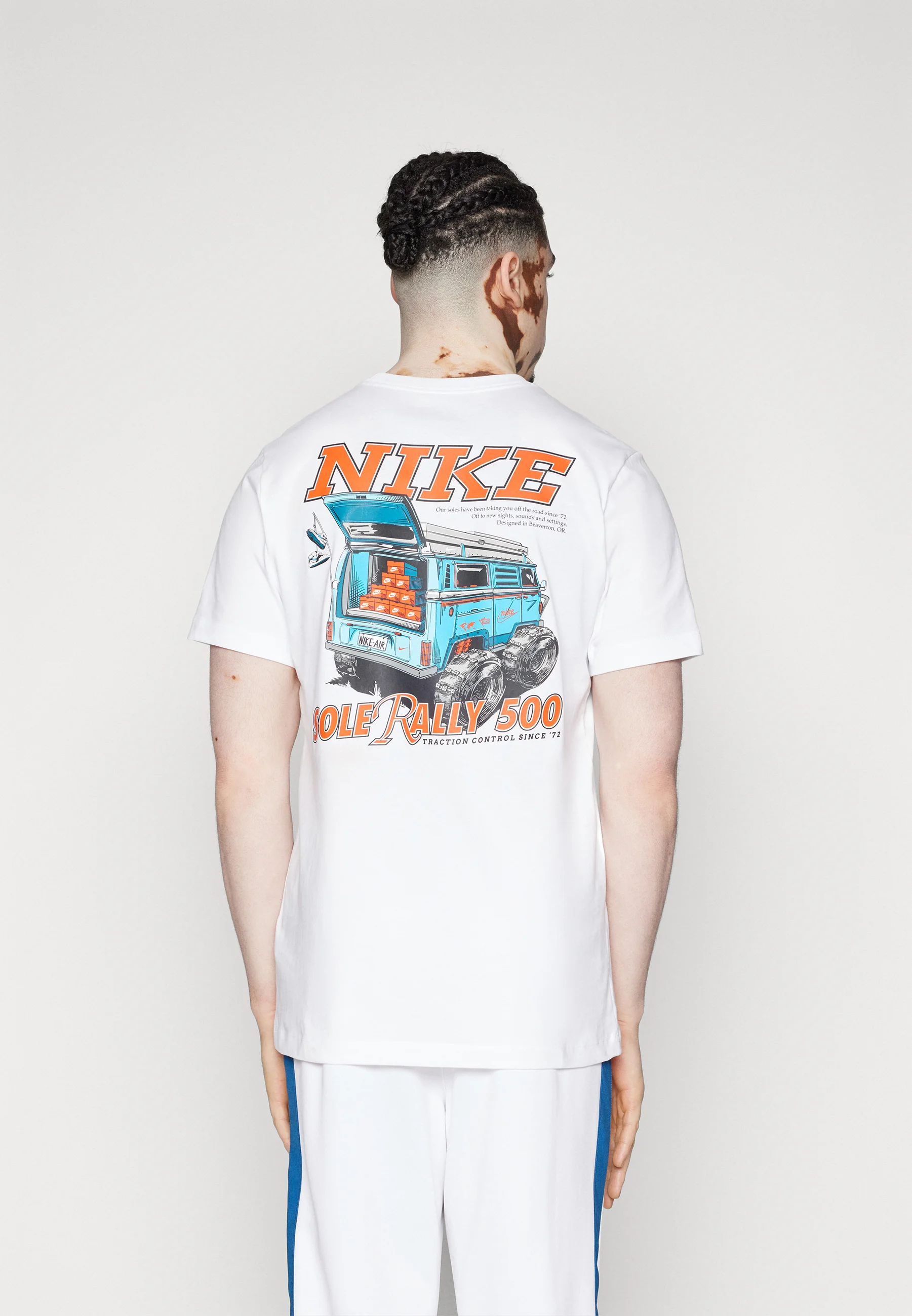 Nike Sportswear RALLY - Camiseta con estampado