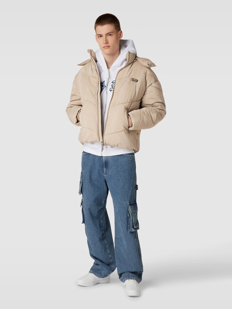 Steppjacke mit Schlangenmuster in ecru