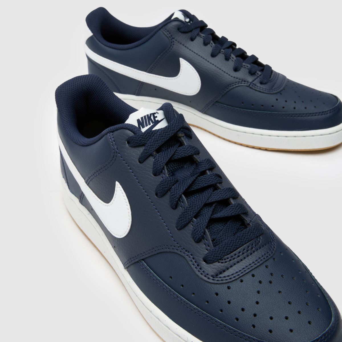 Nike Court Vision – Låga sneakers i marinblått och vitt