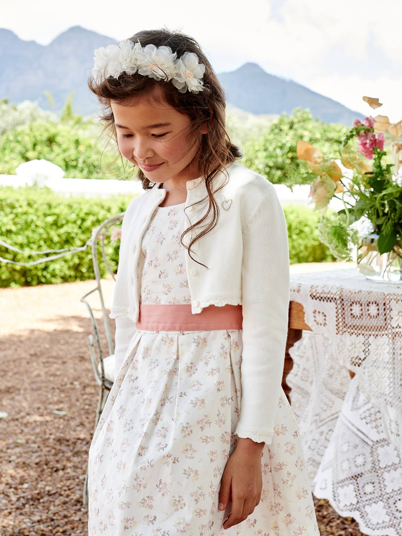 Gilet boléro fille en maille pointelle rose bonbon