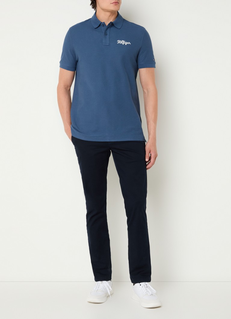 Polo Tommy Hilfiger de corte regular, confeccionada em algodão piqué com bordado do logotipo.