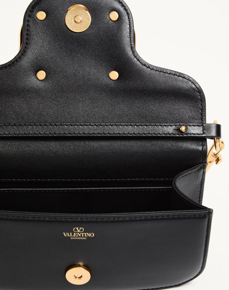 Bolsa de ombro pequena Valentino Garavani Locò em couro de bezerro