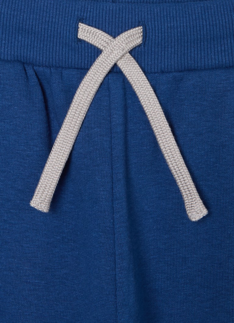 Pantaloni de trening slim fit de la Benetton, cu buzunare laterale.