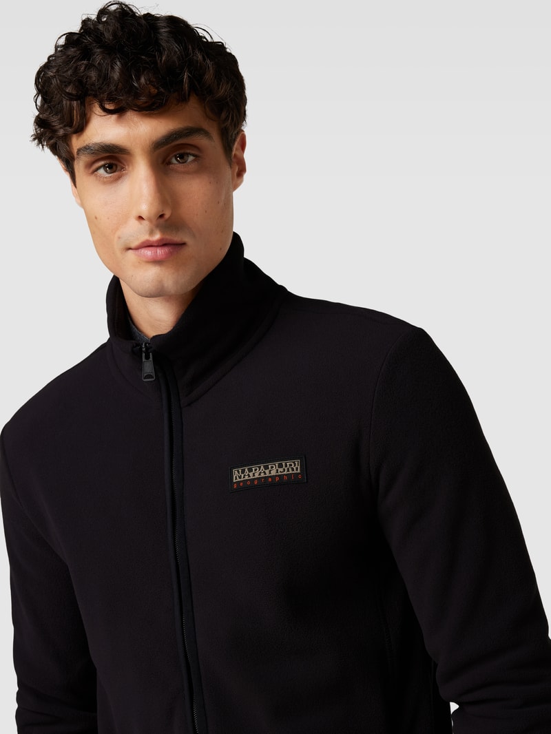 Fleecejacke mit Reißverschlusstaschen Modell 'IAATO' in schwarz