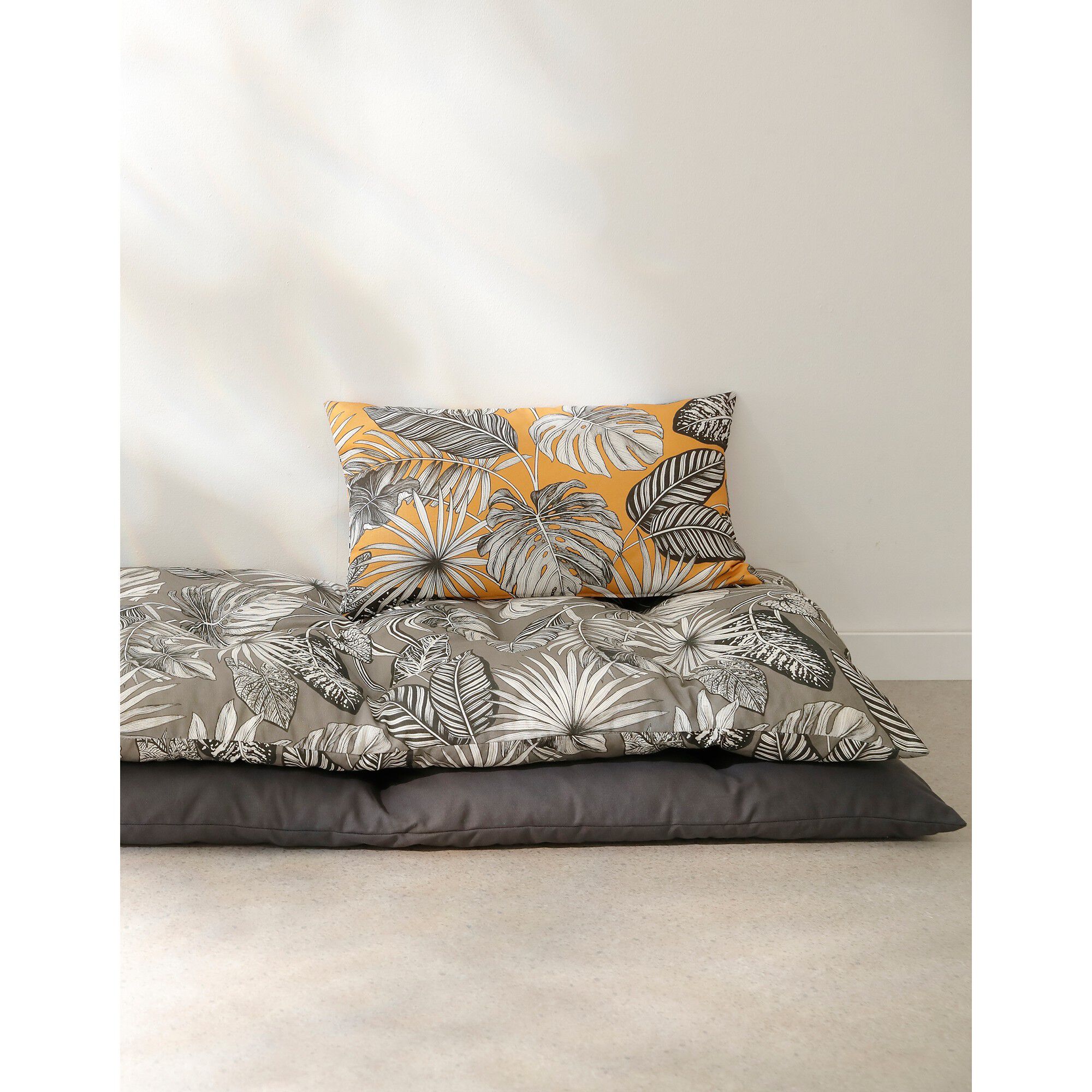 Long coussin de sol uni