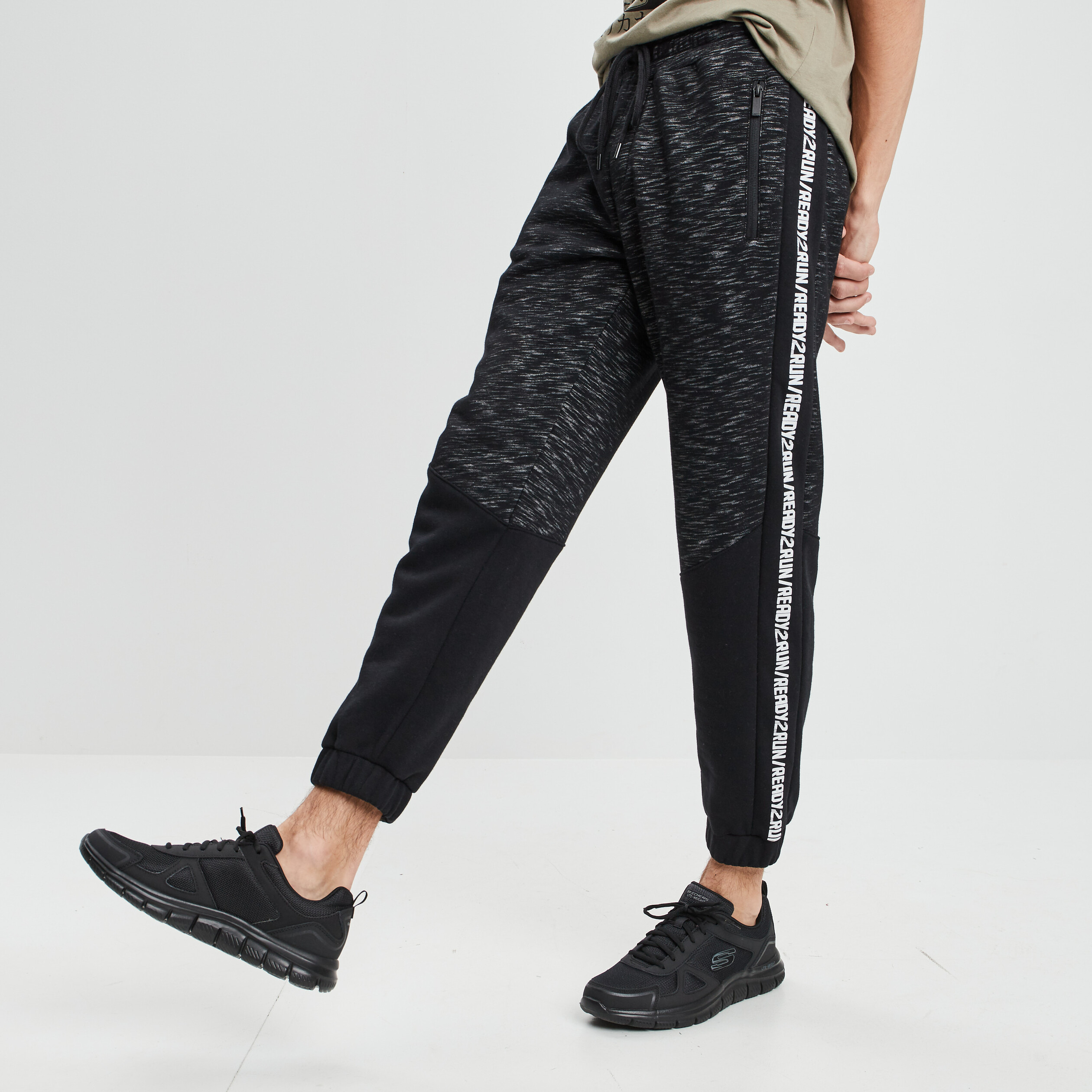 Jogging ajusté avec bandes gris foncé homme | La Halle