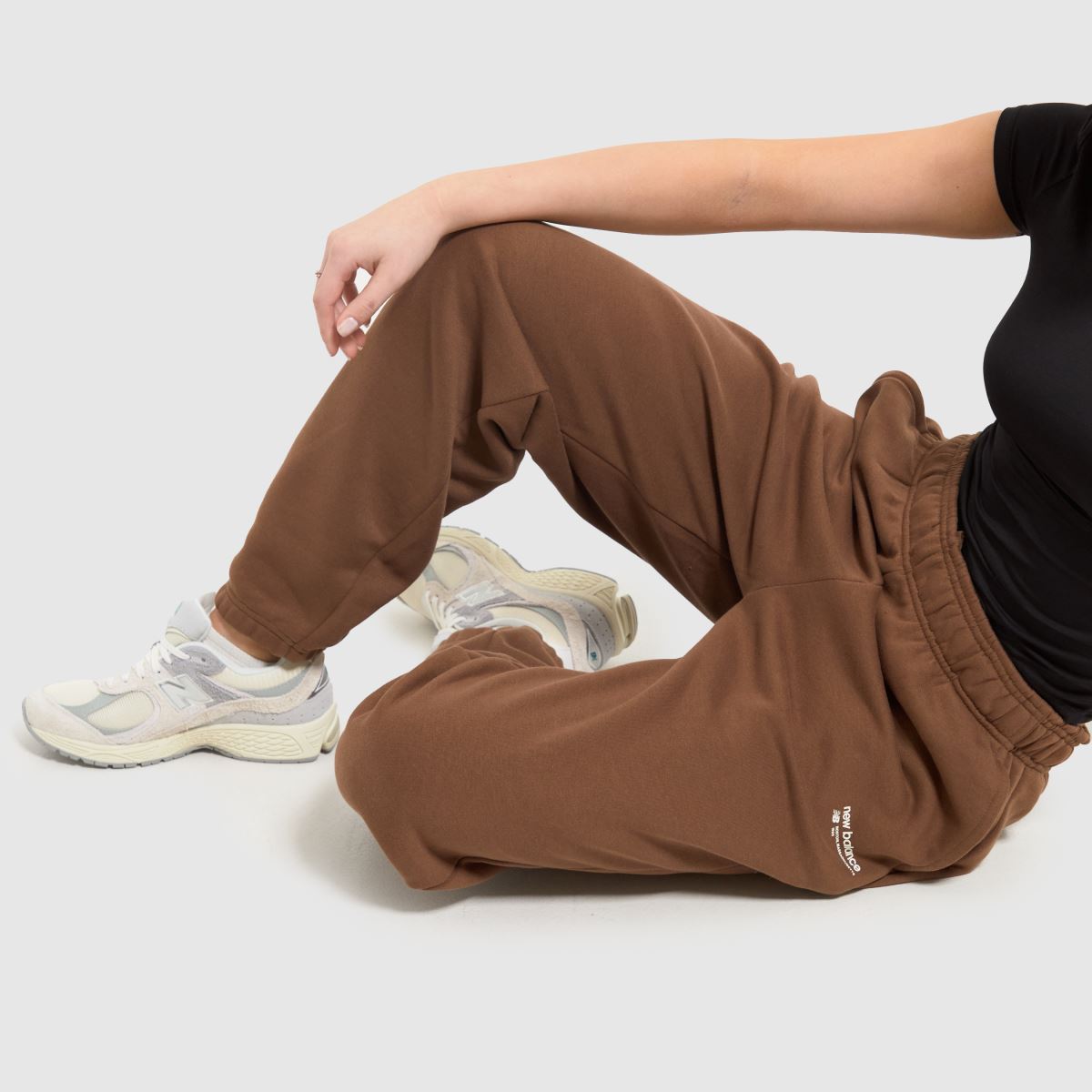 New Balance – Bruna joggingbyxor i borstad fleece