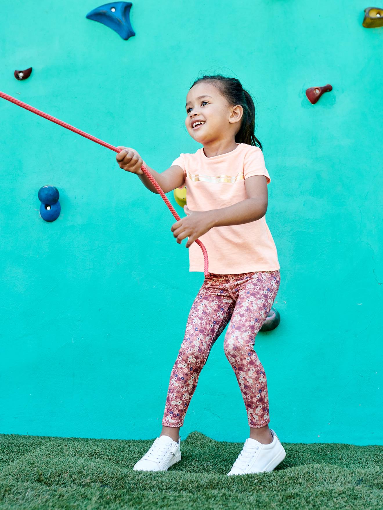 Legging sport imprimé en matière technique fille terracotta