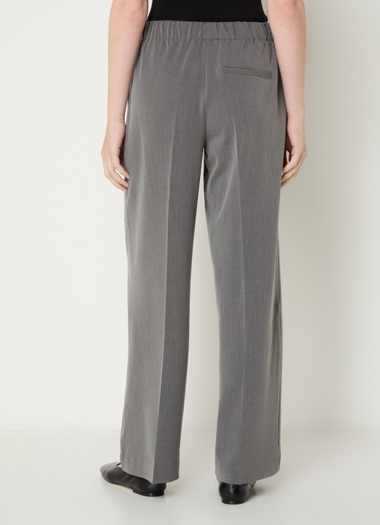 Pantaloni de damă Tara, cu croi larg, talie medie, buzunare laterale.