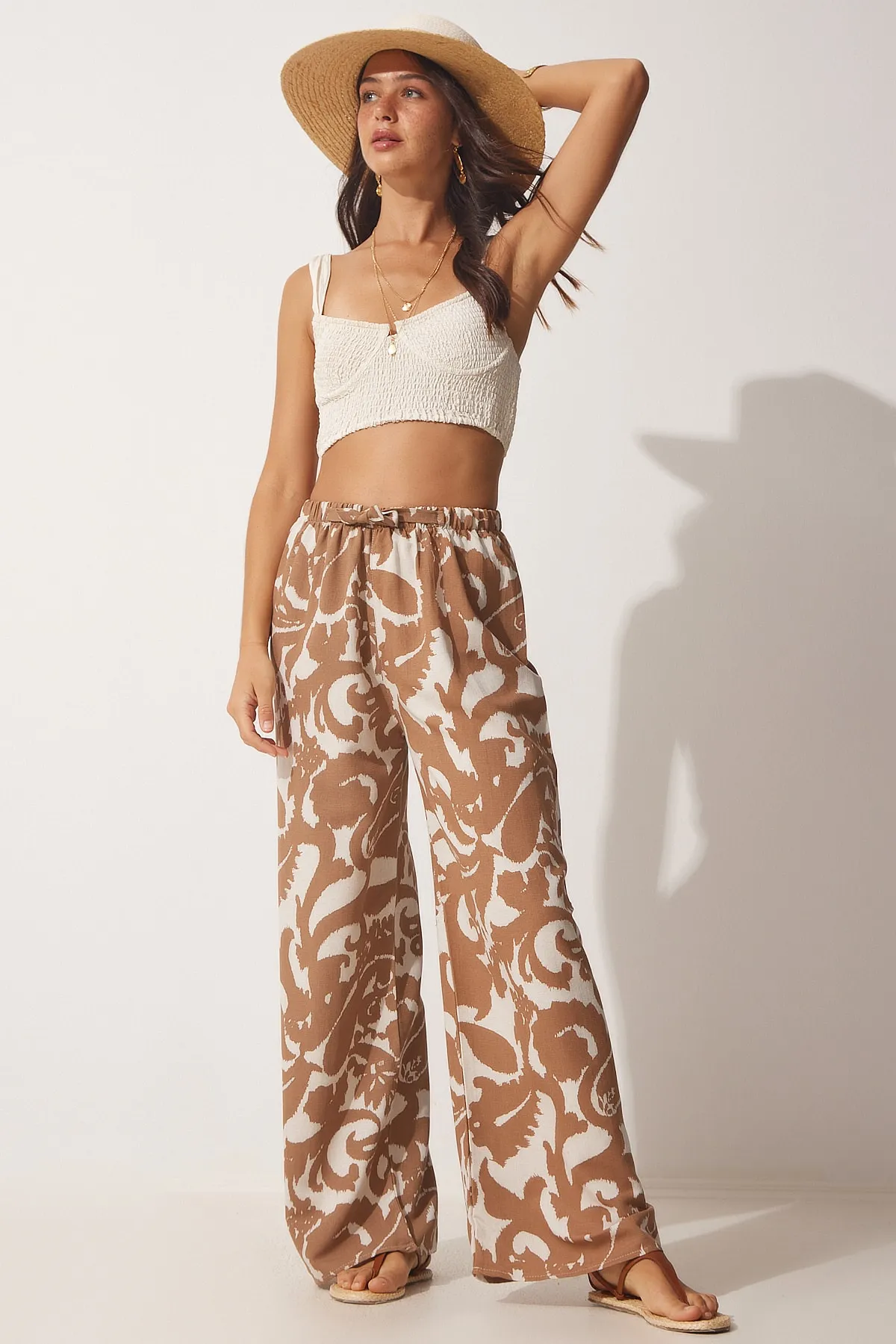 Happiness İstanbul  Braune, cremefarbene, geblümte Leinen-Palazzo-Hose für Damen BH00385
