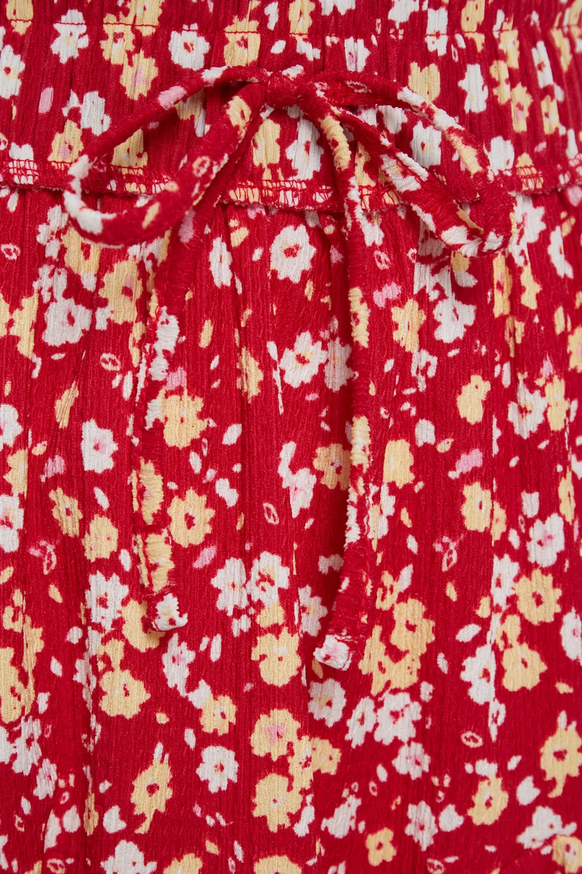 Trendyol Collection  Rosa Rock mit Blumenmuster und Rüschen, normaler Taillenbund, Mini-Wickelrock aus Strick TWOSS23ET00297