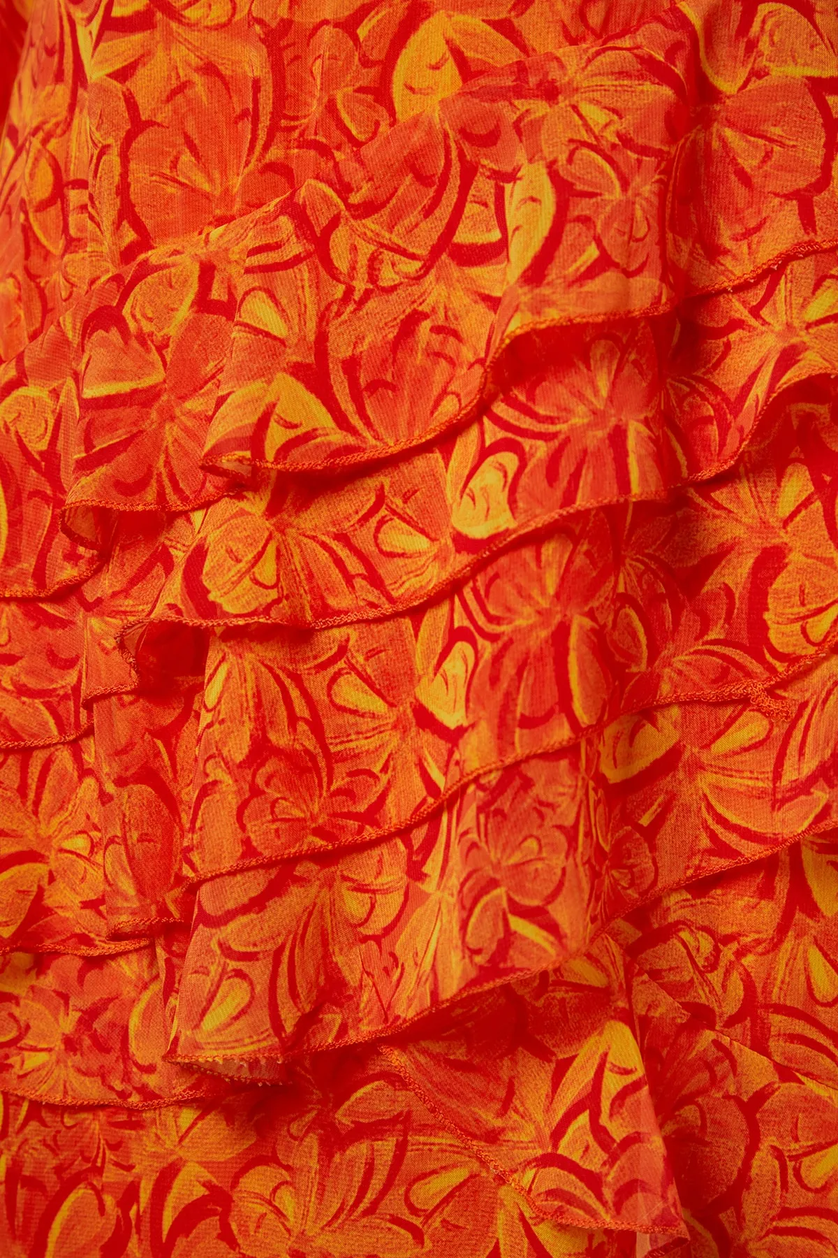 Trendyol Modest  Orangefarbenes Kleid aus gewebtem Chiffon mit Blumenrock, Rüschenfutter TCTSS23EB00160