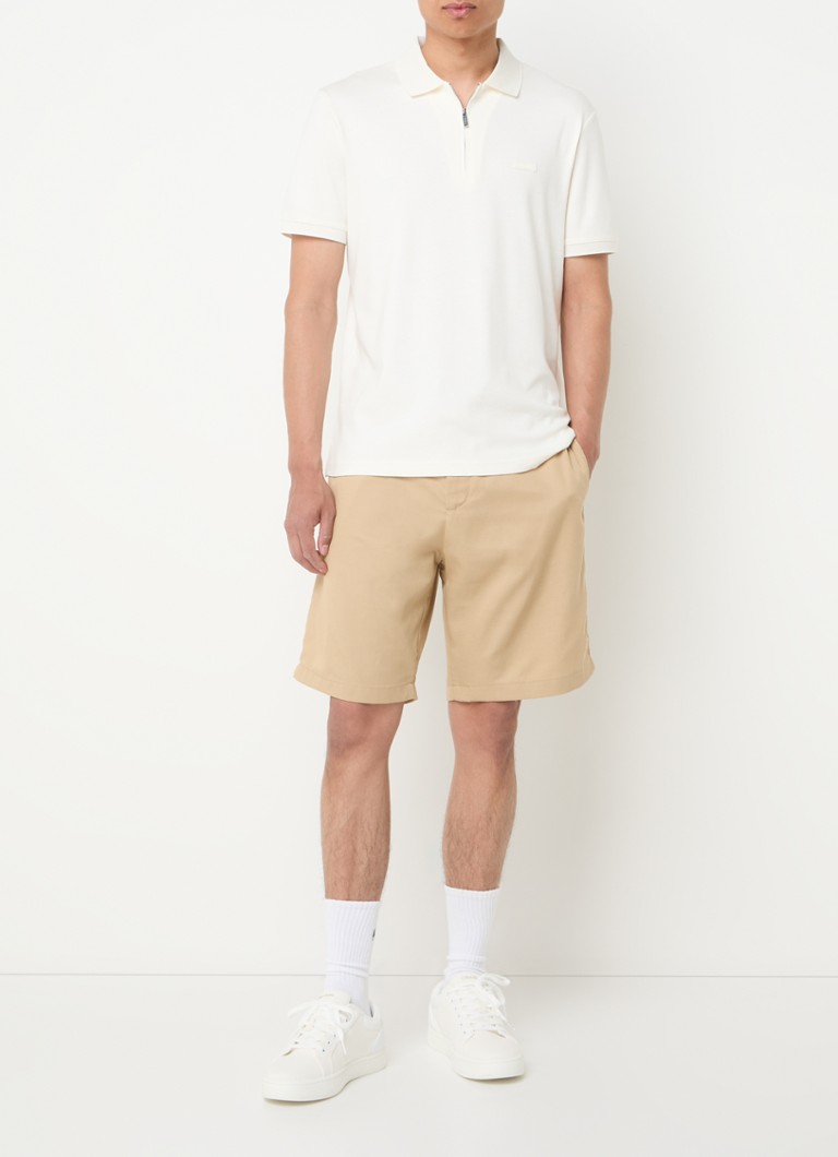 Pantaloni chino cu croi larg, vopsiți în masă, de la Calvin Klein, confecționați dintr-un amestec de in.