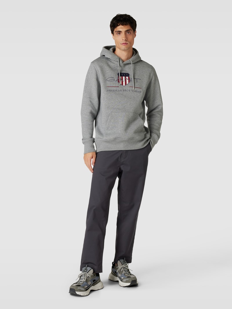Hoodie mit Label-Stitching Modell 'ARCHIVE SHIELD' in silber meliert