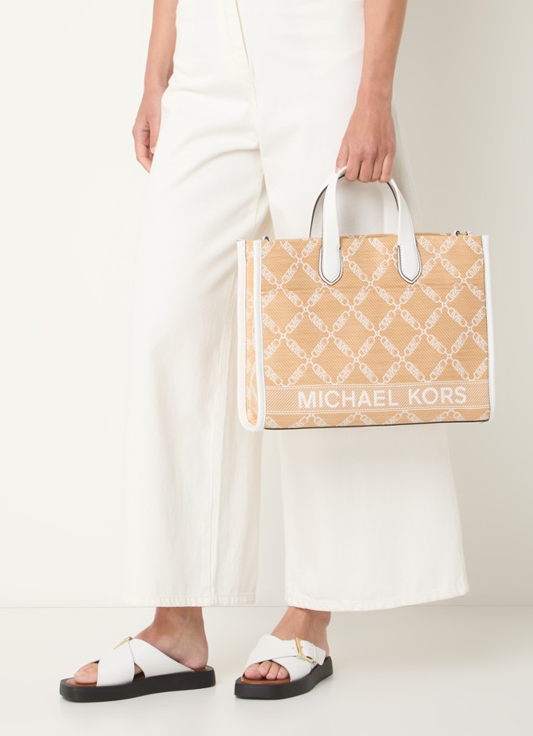 Michael Kors Gigi -käsilaukku irrotettavalla olkahihnalla ja logopainatuksella