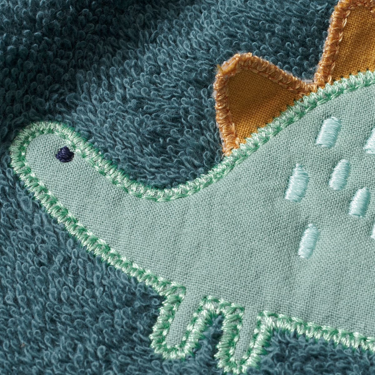 Lätzchen mit Dino-Motiv, grün, 1 St