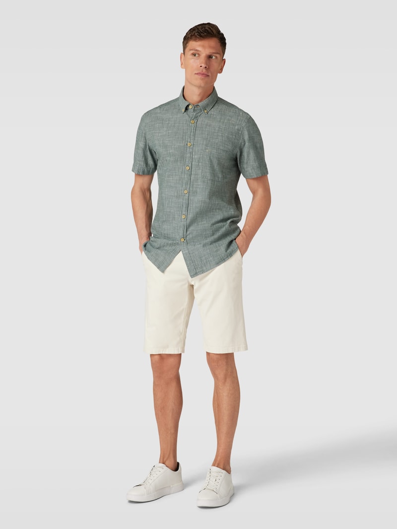 Chinoshorts mit französischen Eingrifftaschen in offwhite