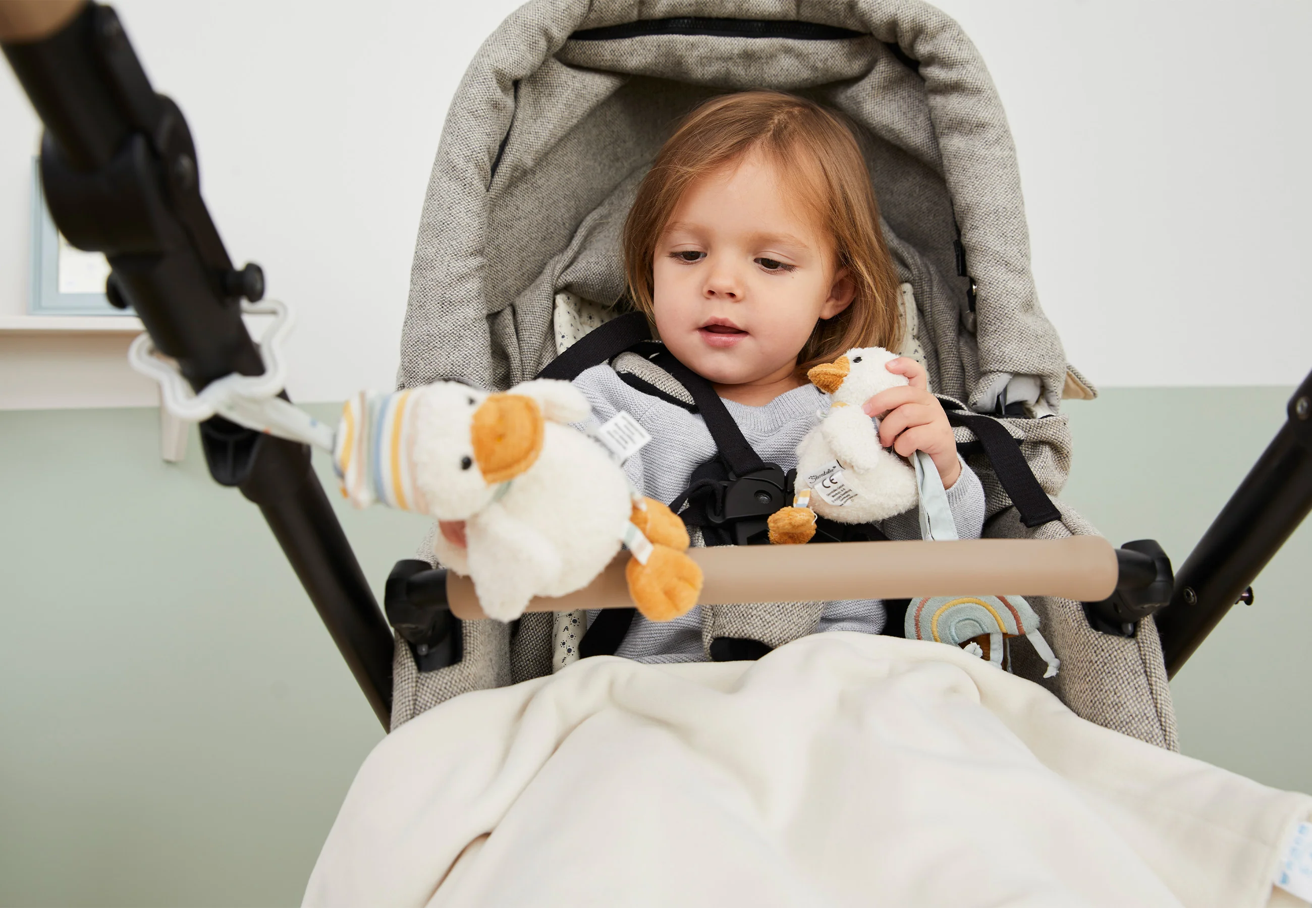 Kinderwagenkette Ente Edda in helltürkis
