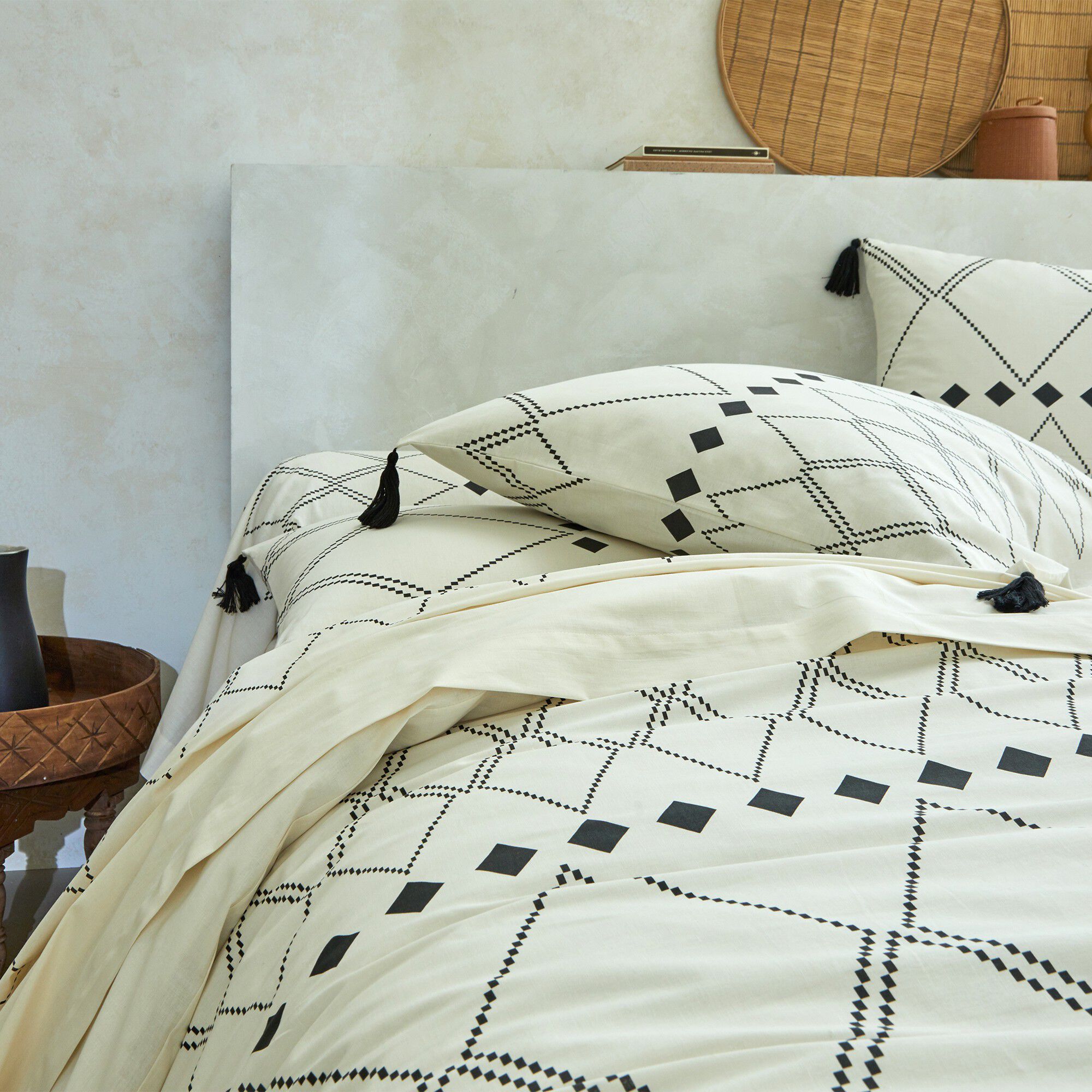 Linge de lit Massaï coton à motifs graphiques et finitions pompons