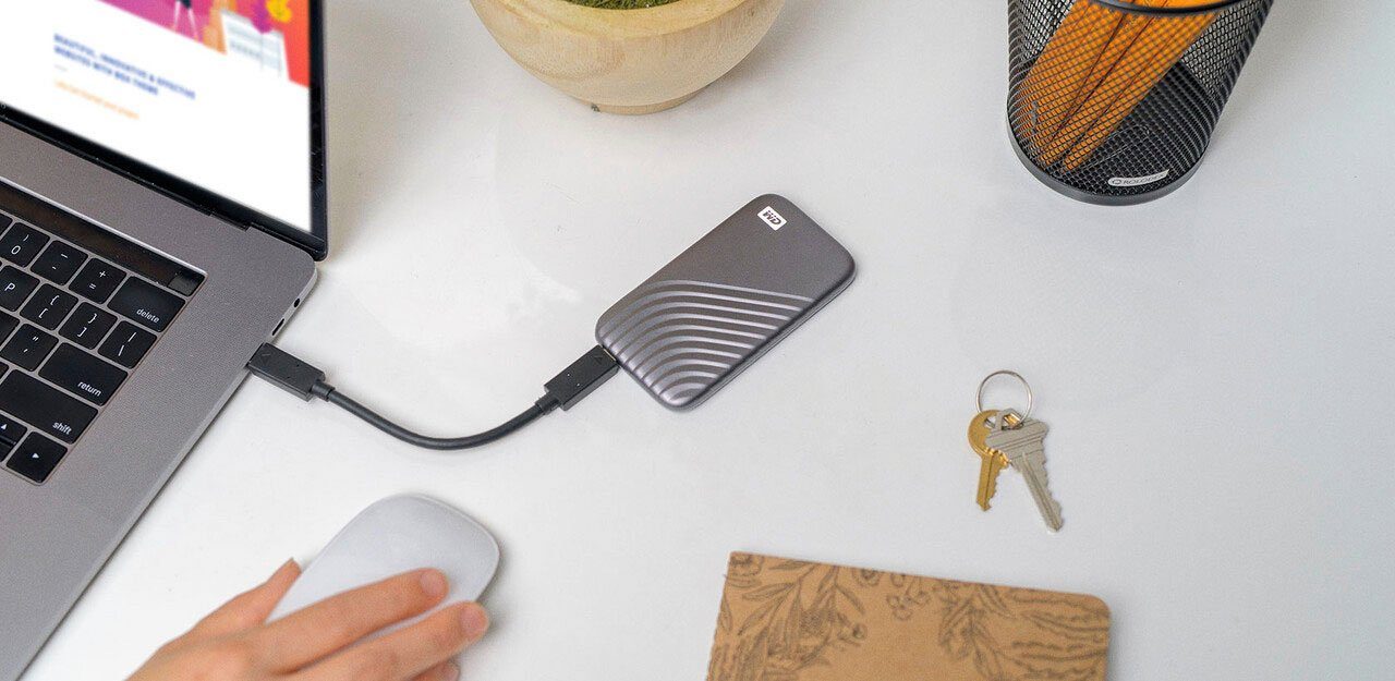 WD My Passport™ SSD externe SSD (4 TB) 1050 MB/S Lesegeschwindigkeit, 1000 MB/S Schreibgeschwindigkeit
