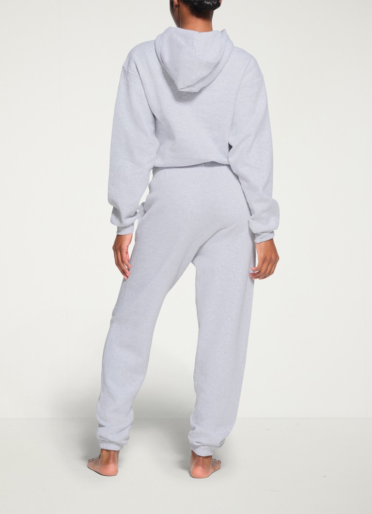 SKIMS  Cotton Fleece mid waist tapered fit loungebroek met steekzakken