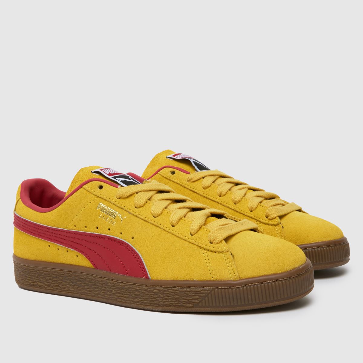 PUMA – Gula terrassskor i mocka