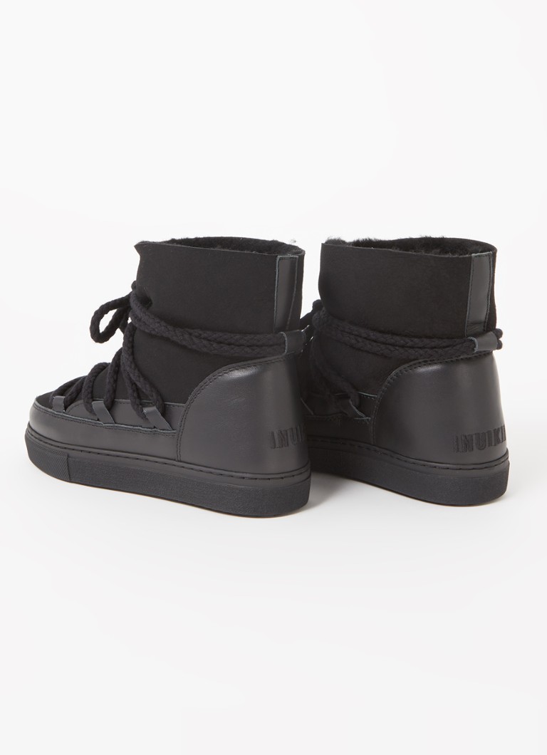 Bota de neve Inuikii Classic em pele de carneiro com detalhes em couro