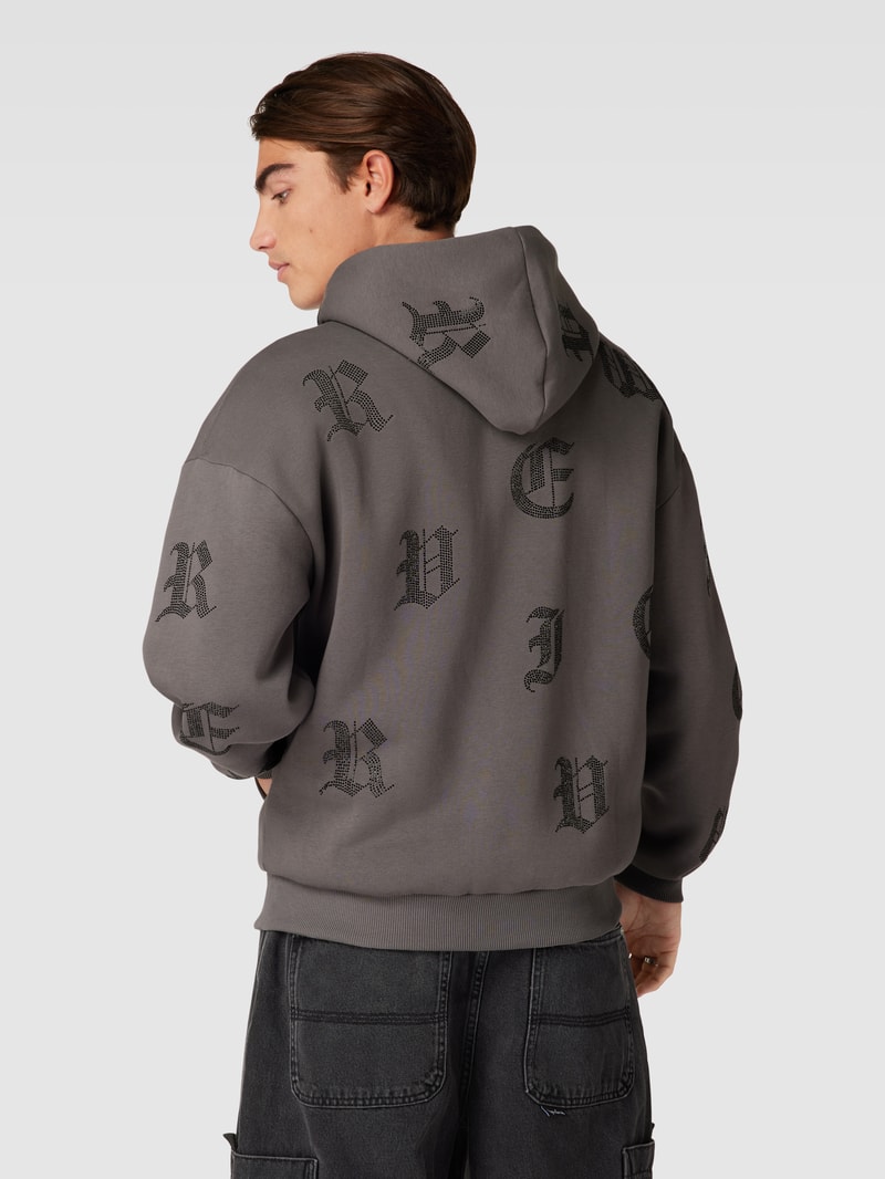 Sweatjacke mit Ziersteinbesatz in dunkelgrau