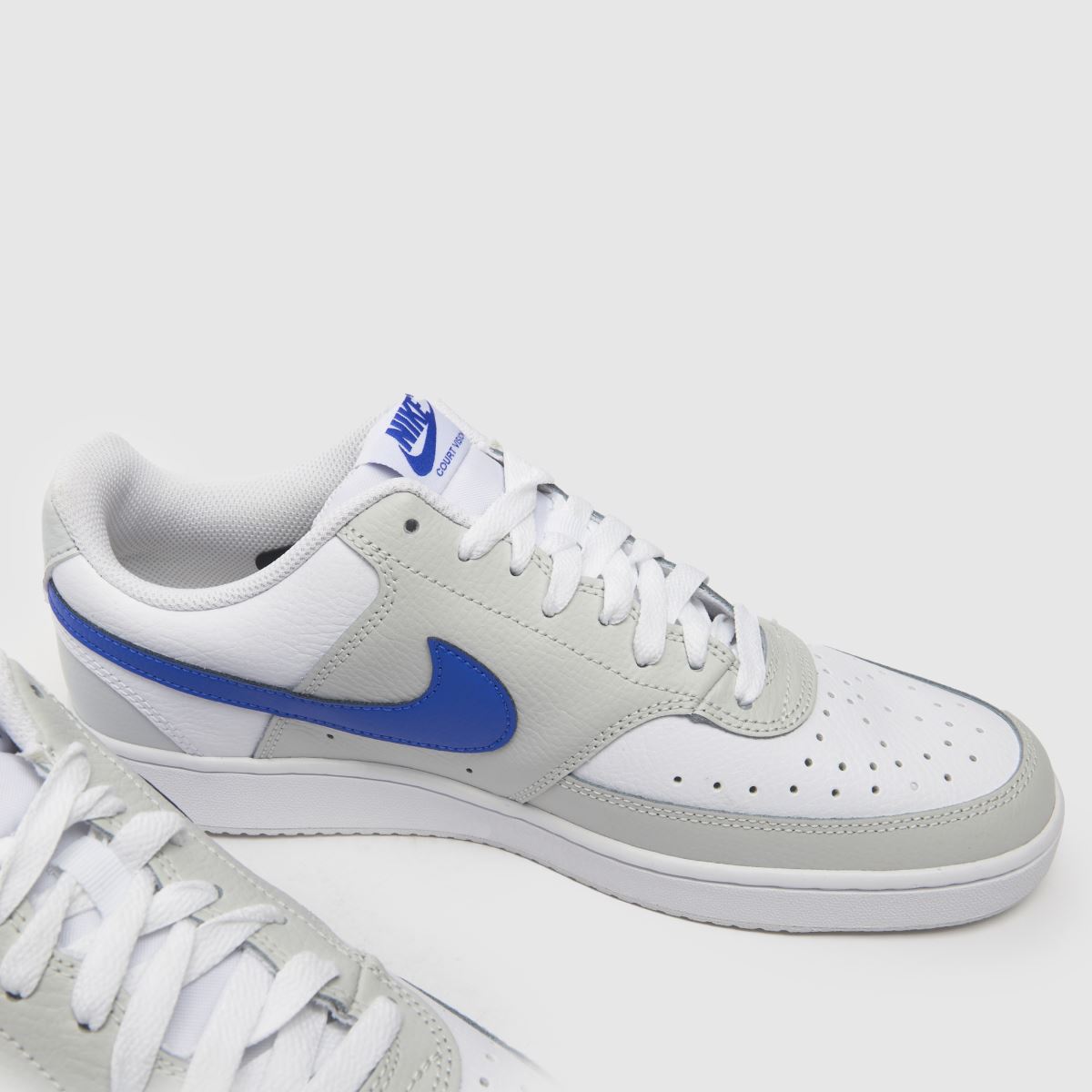 Športni copati Nike Court Vision v beli in modri barvi