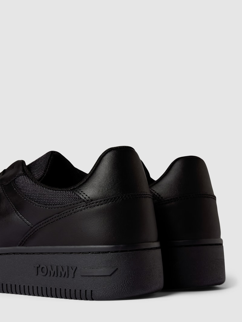 Sneaker aus Leder-Mix in schwarz