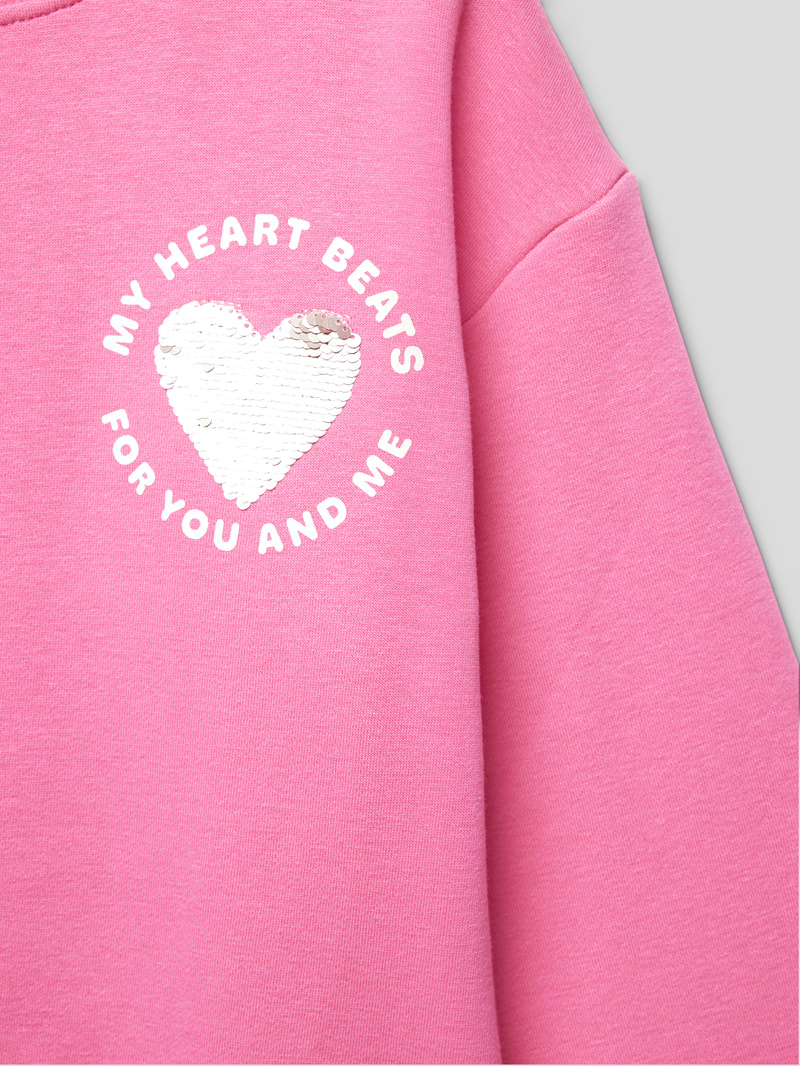 Sweatshirt mit Paillettenbesatz in pink