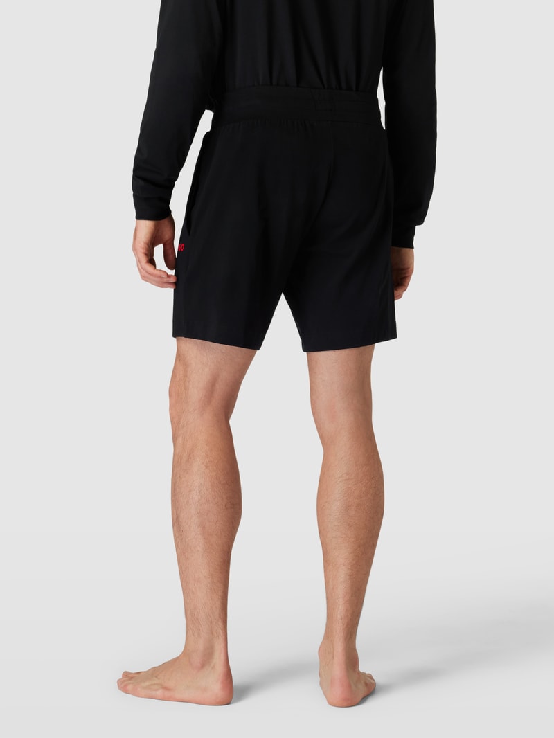 Shorts mit elastischem Bund und Label-Detail in schwarz