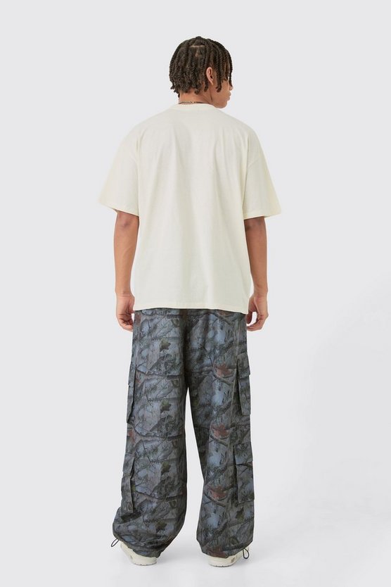 Oversize T-Shirt mit Gothic Homme Print