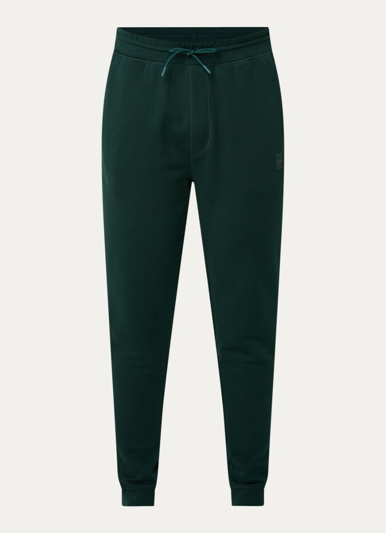 Pantaloni de trening slim fit de la HUGO BOSS, cu logo și buzunare laterale.
