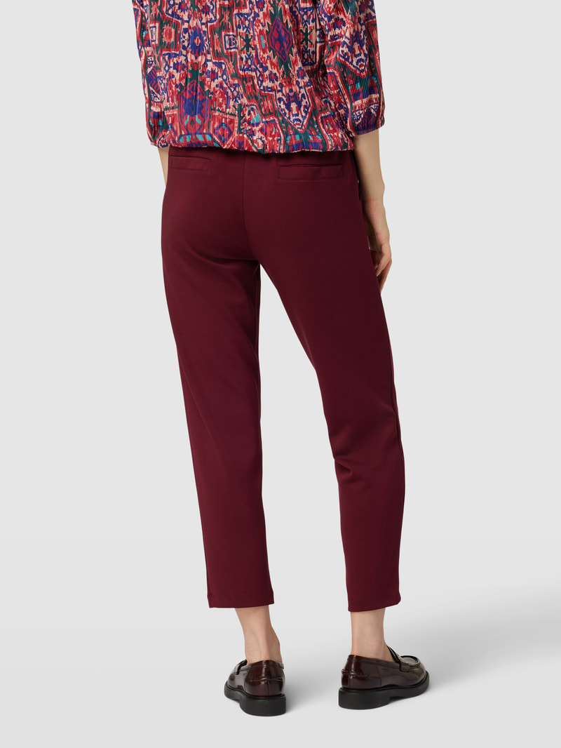 Stoffhose mit Ziernähten in bordeaux rot