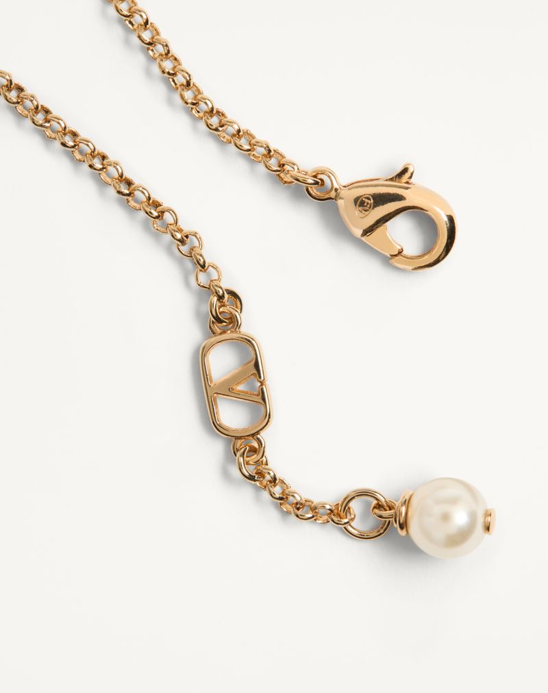 Ovalet armbånd i metal og Swarovski® perle