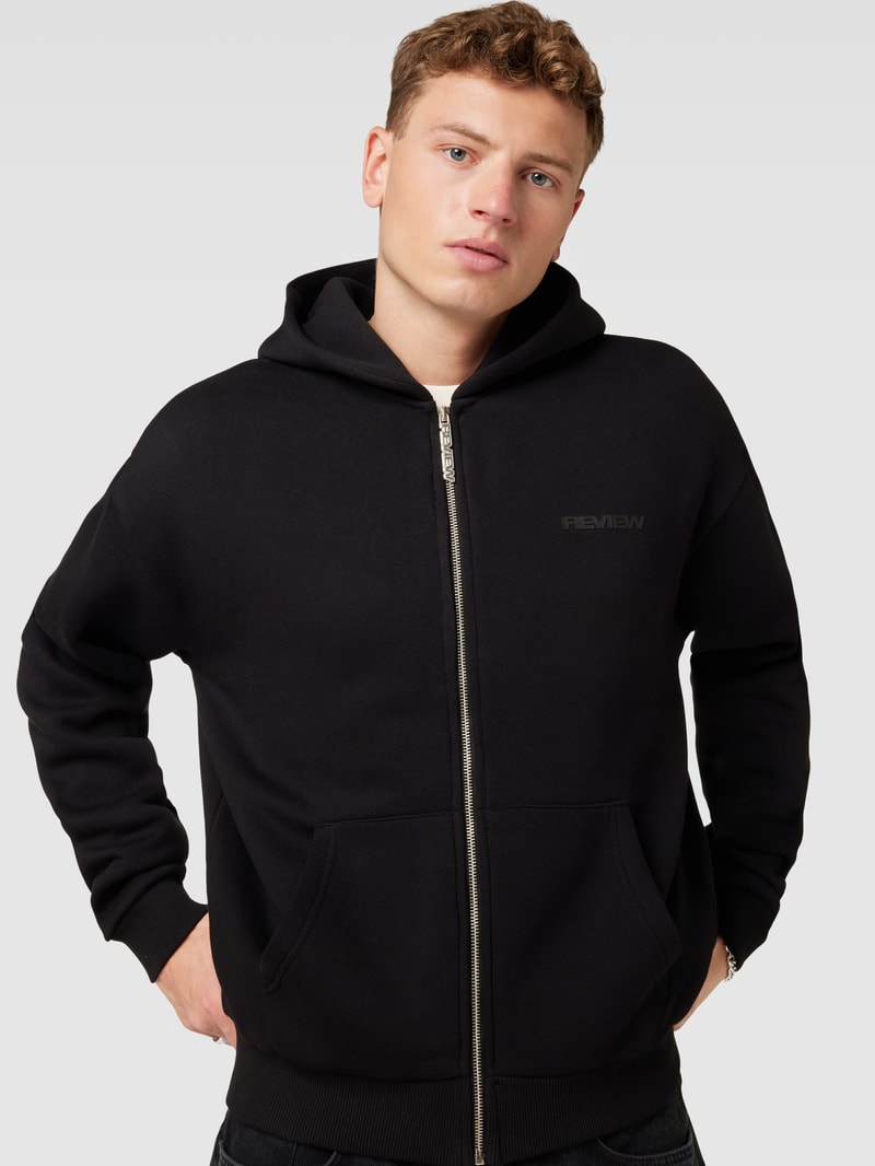 Sweatjacke mit Kapuze in schwarz