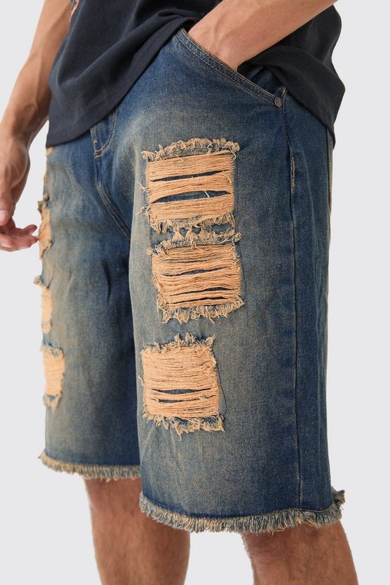 Lockere Jeansshorts mit Rissen in Vintage Blau
