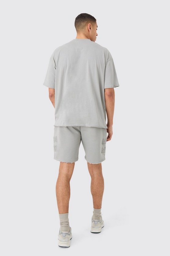 Kastiges zerrissenes Man T-Shirt & Shorts