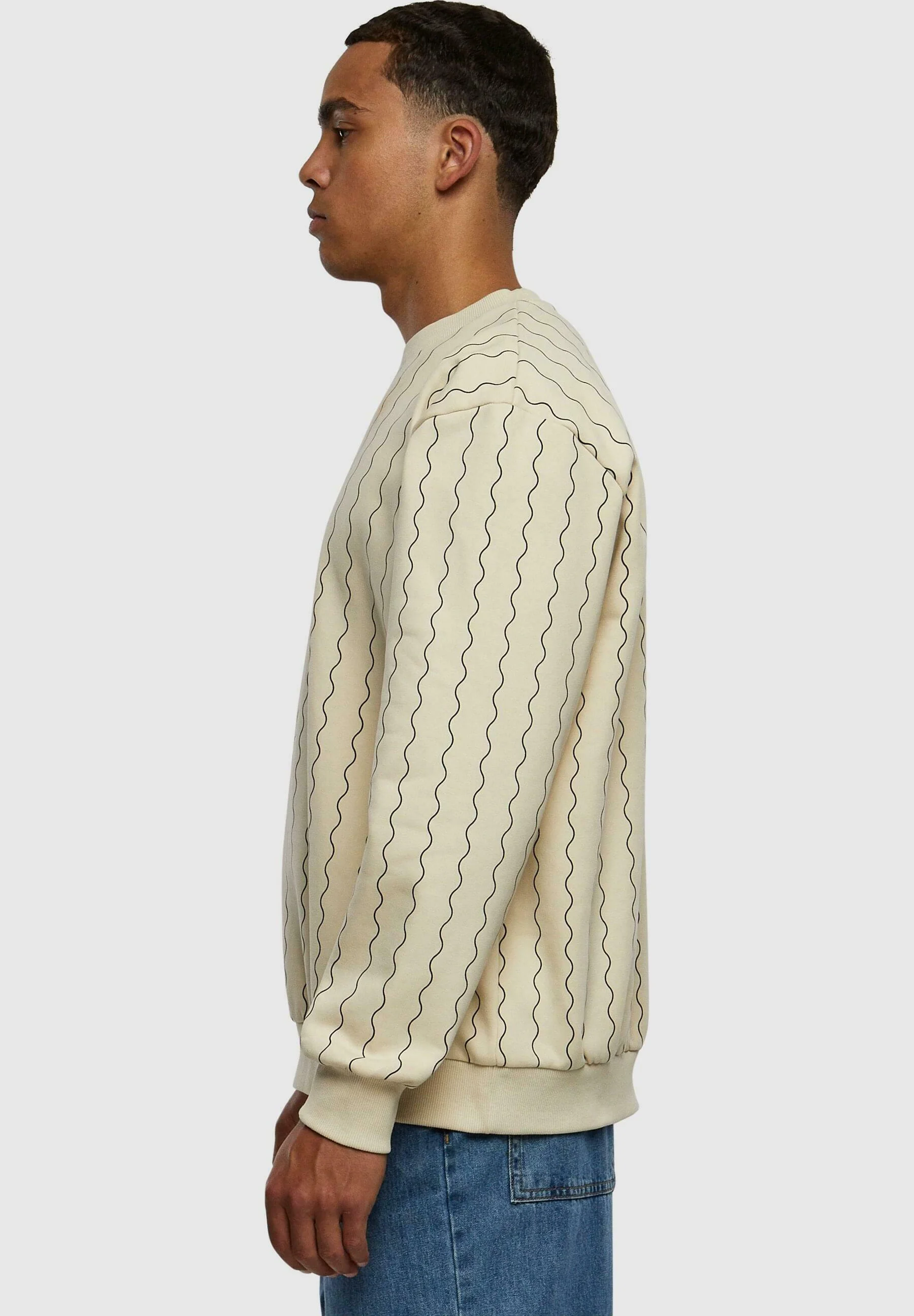 Sudadera Karl Kani con cuello redondo, rayas ziczac y firma pequeña