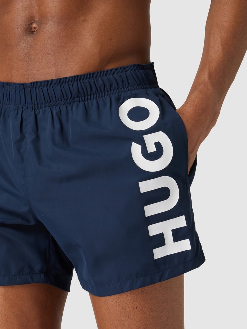 Badehose mit Label-Schriftzug Modell 'ABAS' in marineblau