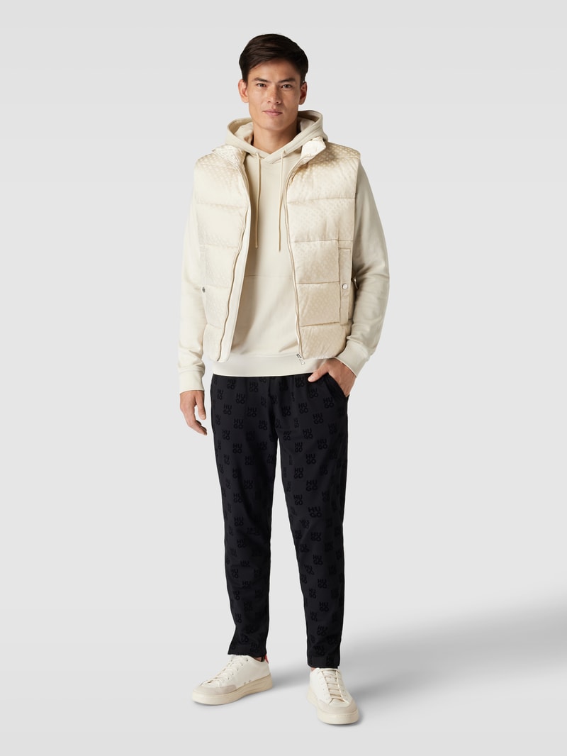 Steppweste mit Logo-Muster in offwhite