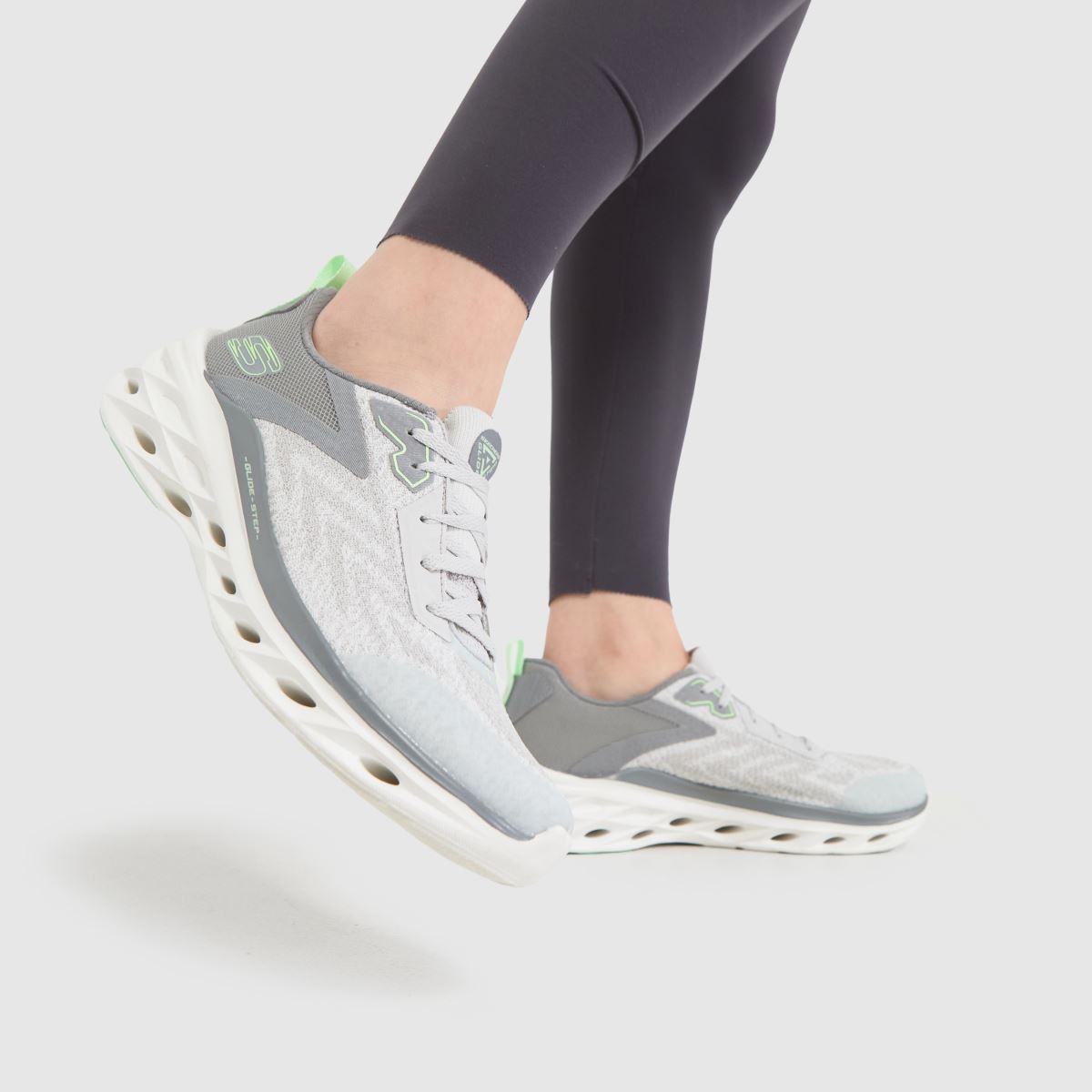 Světle šedé tenisky SKECHERS Glide Step Swift