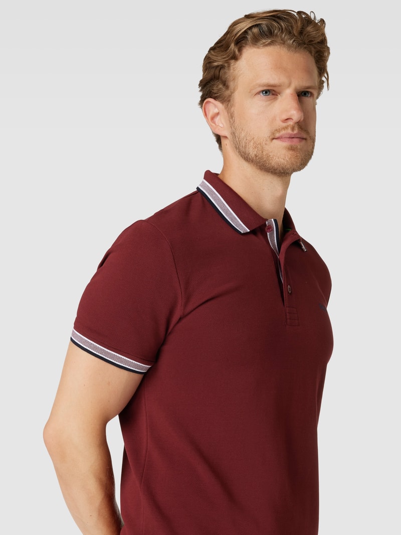 Poloshirt mit Label-Stitching Modell 'PADDY' in dunkelrot