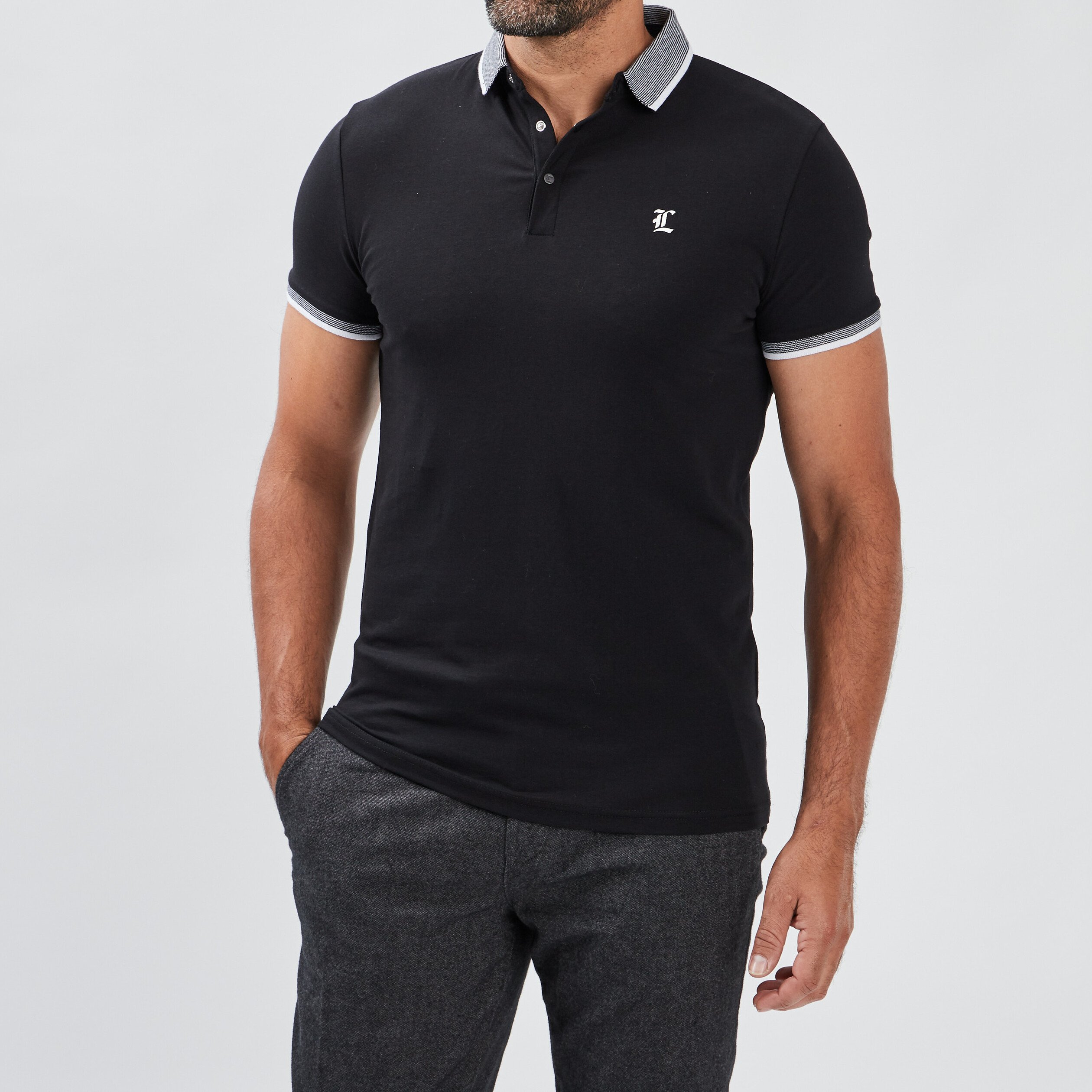 Polo ajusté manches courtes noir homme | La Halle