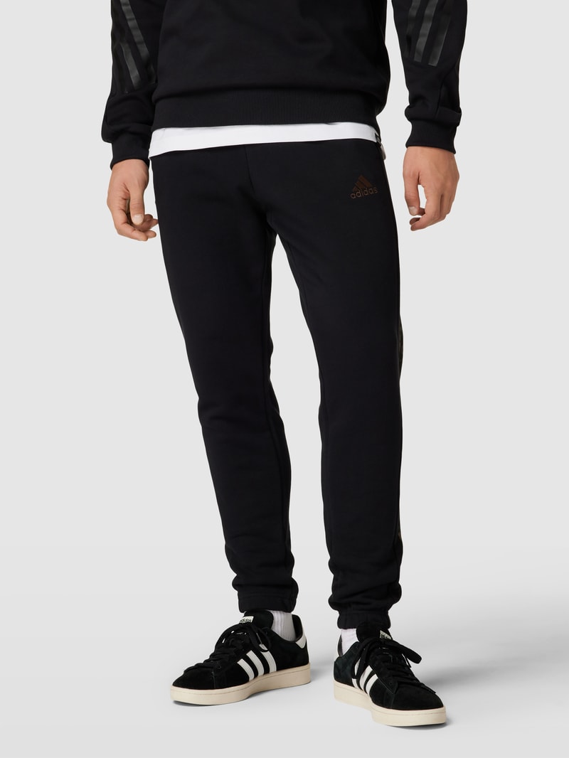 Jogpants mit elastischem Bund und Tunnelzug in schwarz